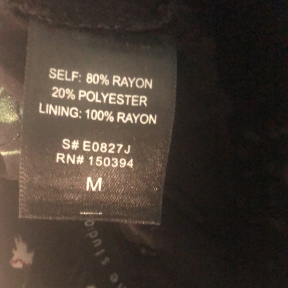 Forever21 jumpsuit, black , with small white Daisy! Open back. Has Pockets!!! - Picture 4 of 4